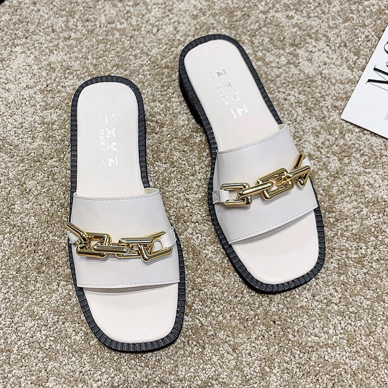 Dear elegant slippers with decorative chain accessory Lune London