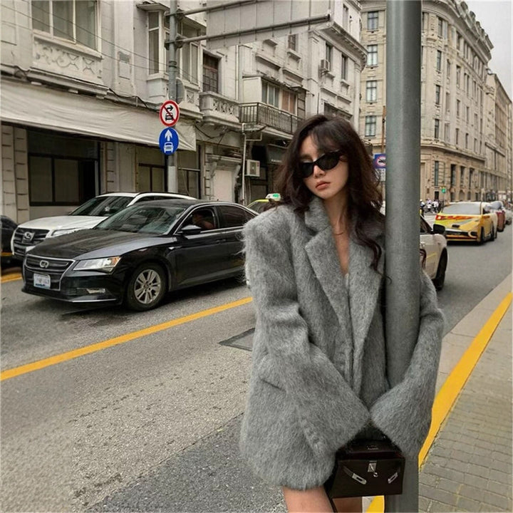 Elegant blazer for women with soft fur and decorative button details Lune London