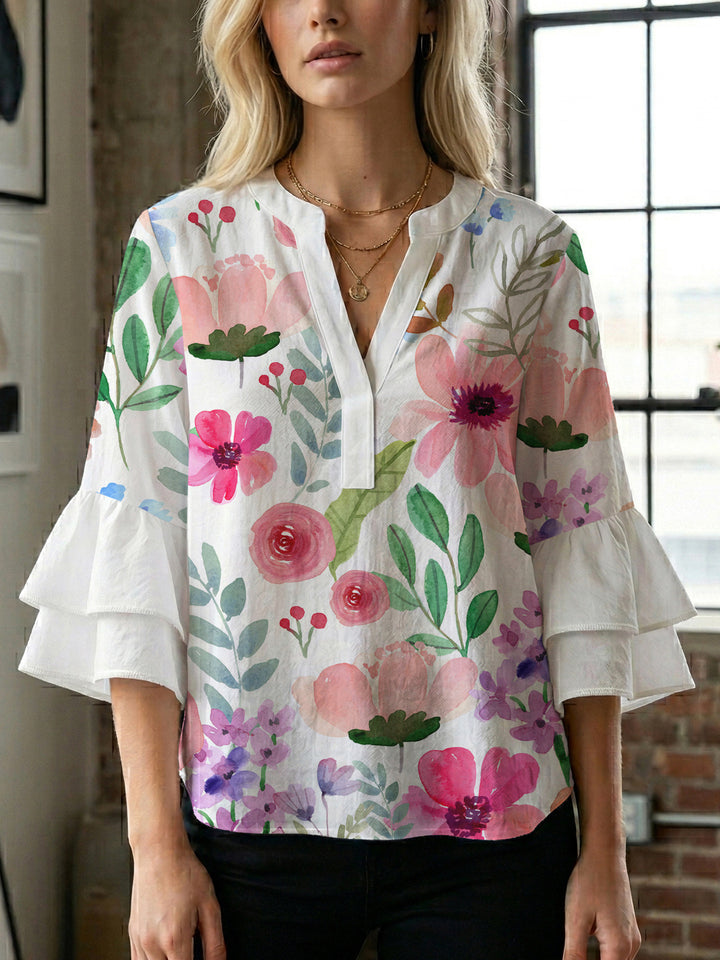 Ladies elegant top with voluminous ruffle hems and floral design Lune London