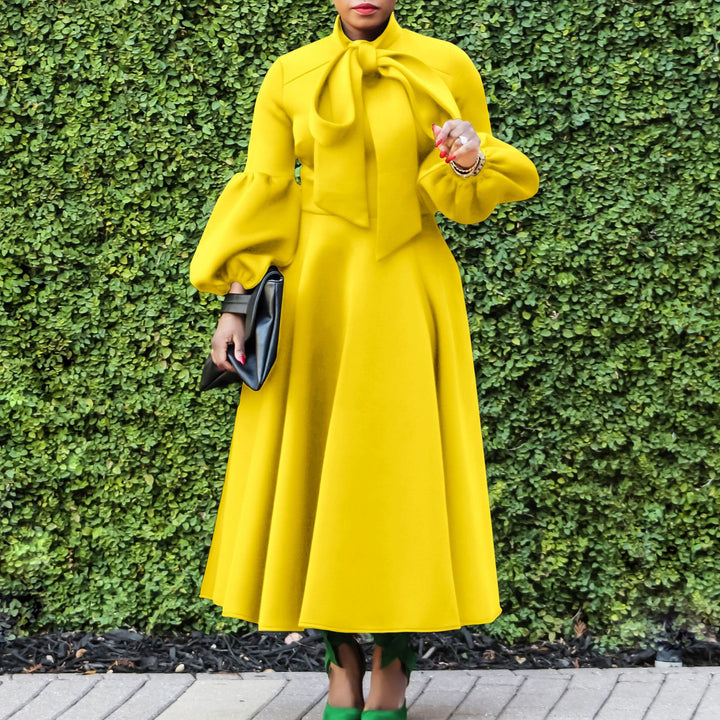 Midi dress for ladies with tie neck and voluminous sleeves Lune London
