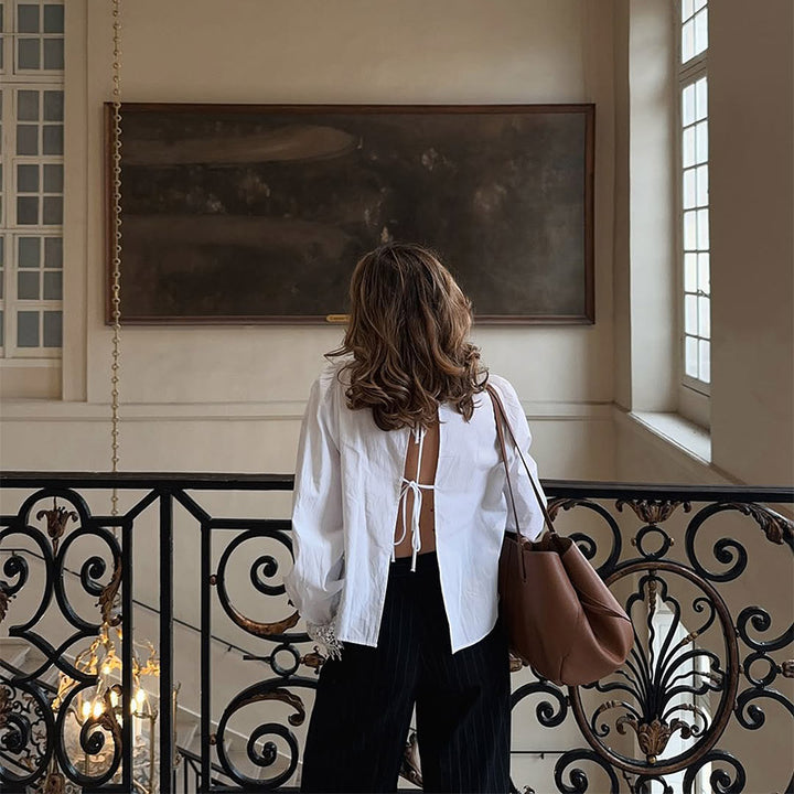 Blouse for women with elegant lace accents and puff sleeves Lune London