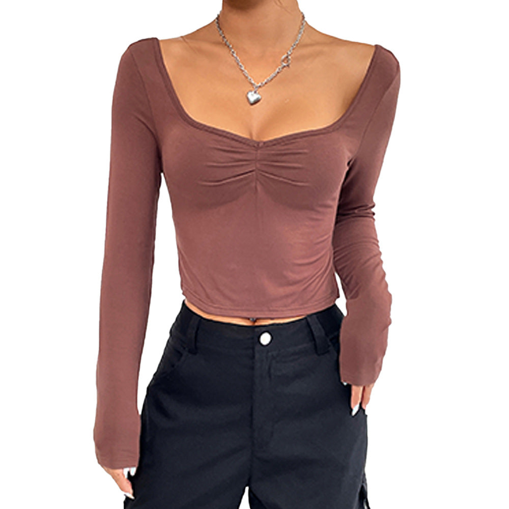 Chic & Stil Elegant long-sleeve cropped top for women with a stylish ruched effect