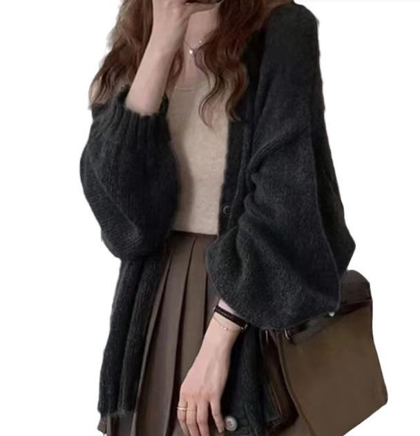 Elegant knit jacket with wide sleeves and refined details Lune London