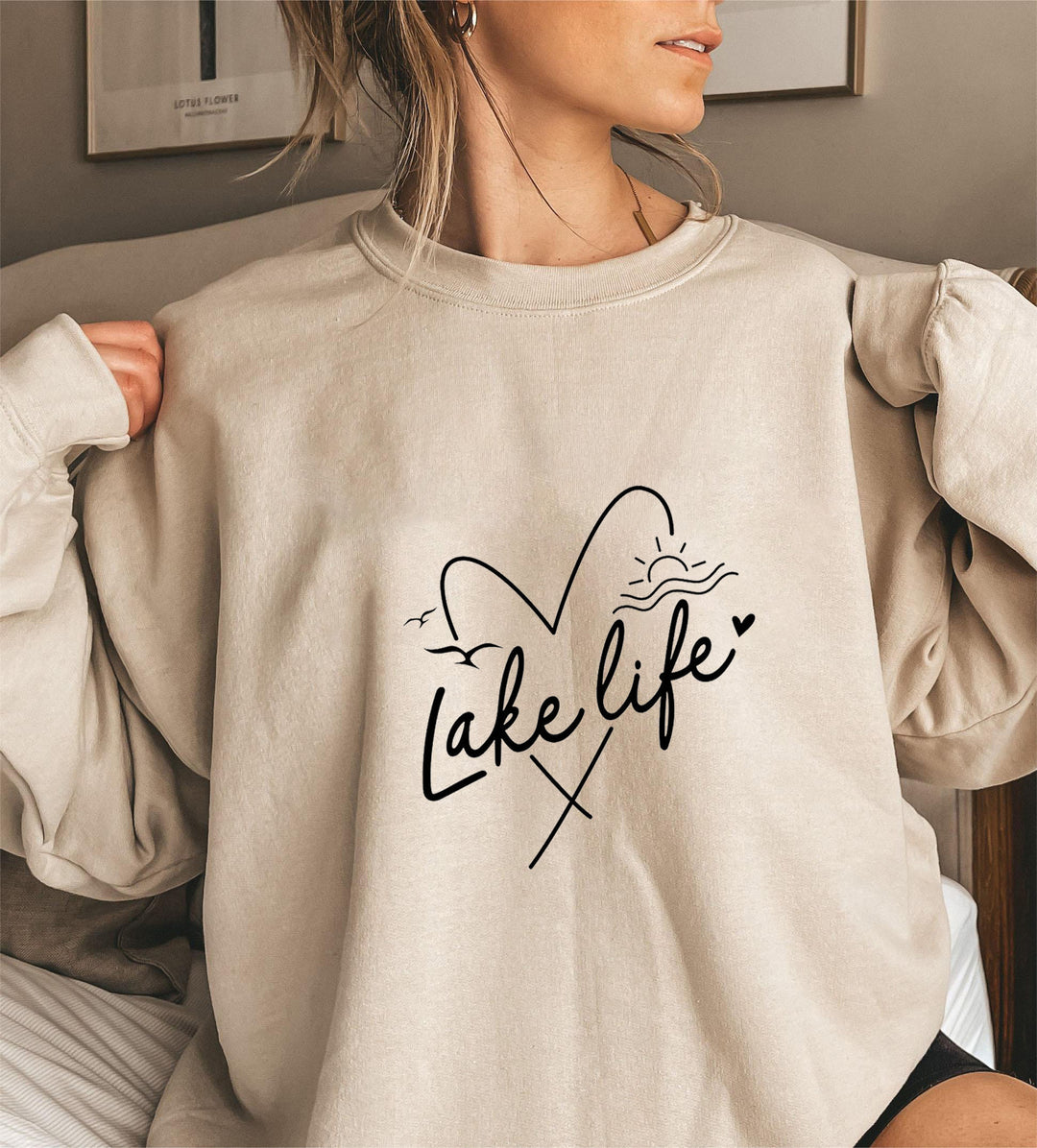 Sweatshirt pour femme avec des manches courtes et un motif en forme de cœur Chic & Stil