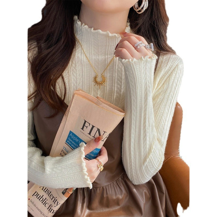 Pull femme à col roulé avec ourlet en vagues décoratif en tricot fin Chic & Stil