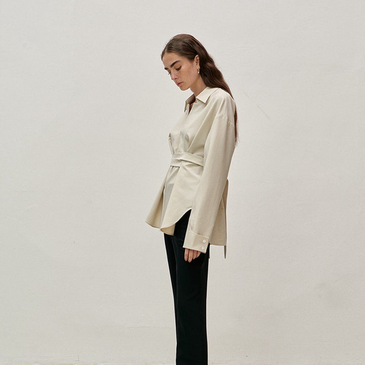 Trendy women's blouse with asymmetric cut and elegant waist Lune London