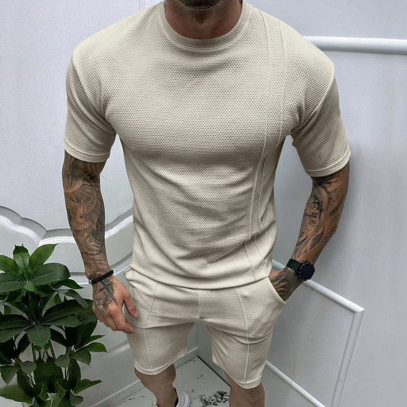 Men's short sleeve sports set with an innovative textured design and practical side pockets Lune London