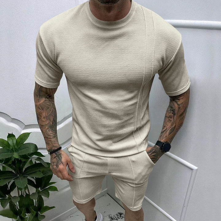 Men's short sleeve sports set with an innovative textured design and practical side pockets Lune London