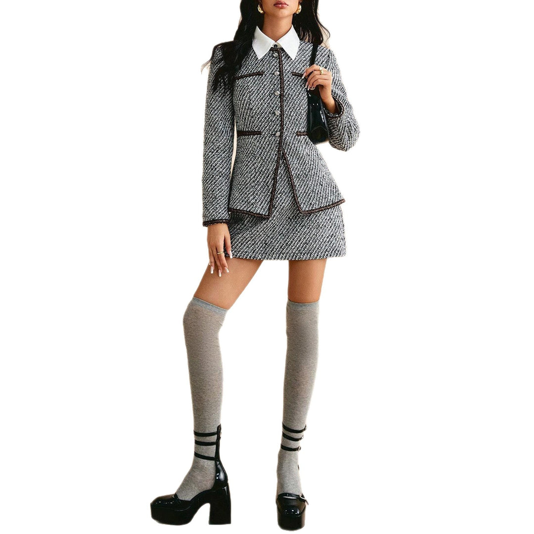 Ladies elegant tweed suit with textured jacket and chic dress