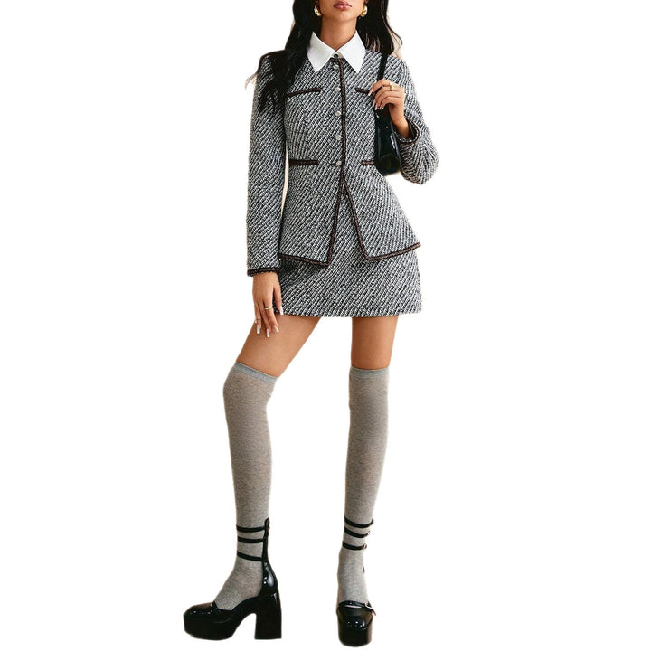 Ladies elegant tweed suit with textured jacket and chic dress