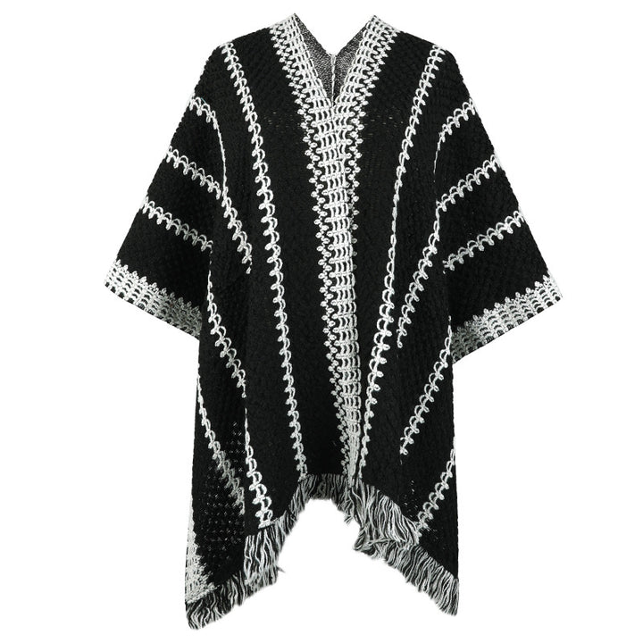 Knit poncho for women with V-neck and fringes Lune London