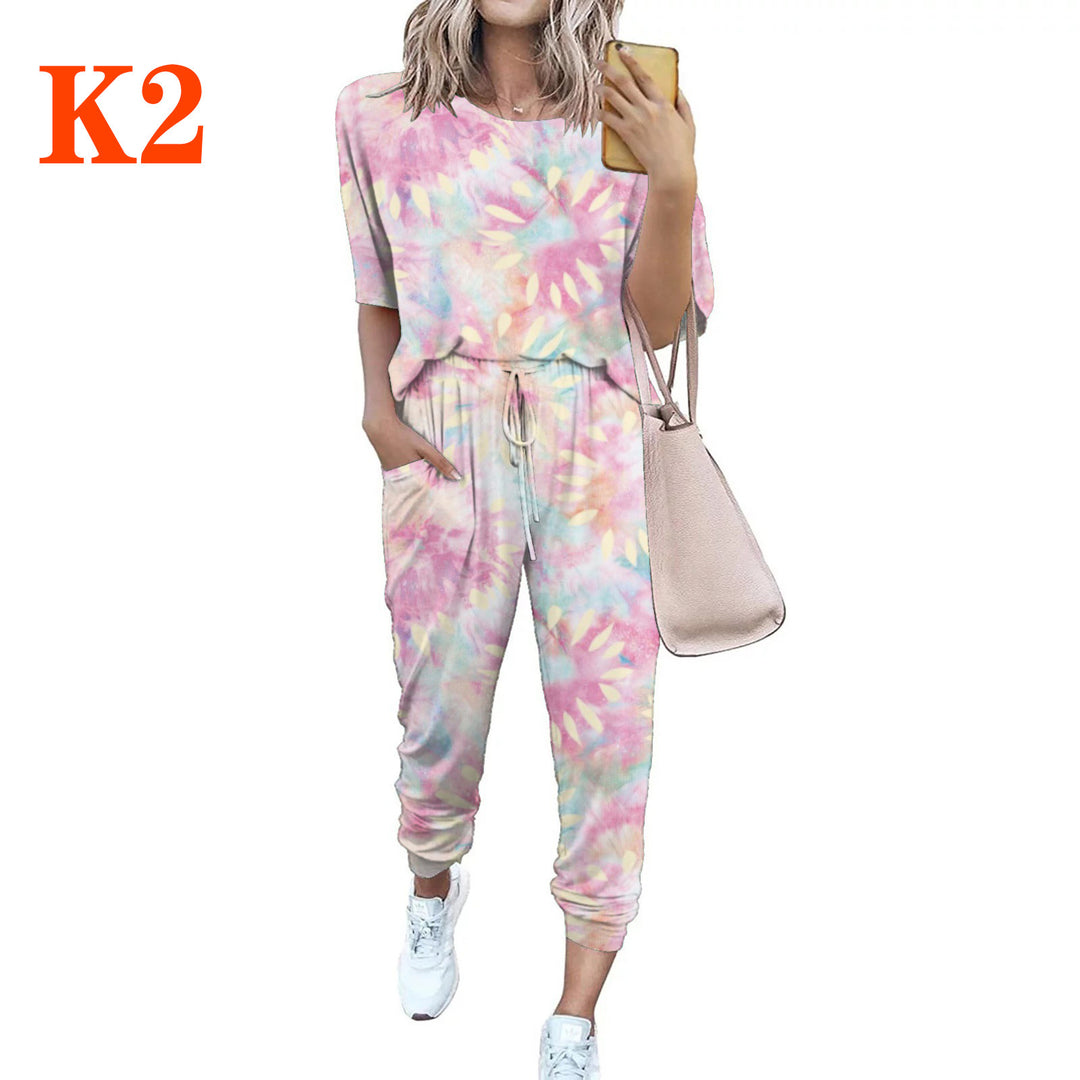 Ladies lightweight casual jumpsuit with a striking tie-dye pattern and practical pockets Lune London