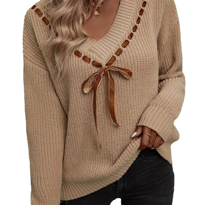 Pull en tricot pour femmes avec décolleté en V et bande décorative à nouer Chic & Stil
