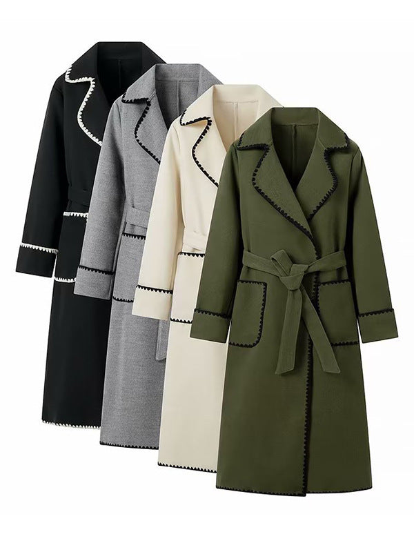 Elegant long coat for women with a tie belt and contrasting piping Lune London