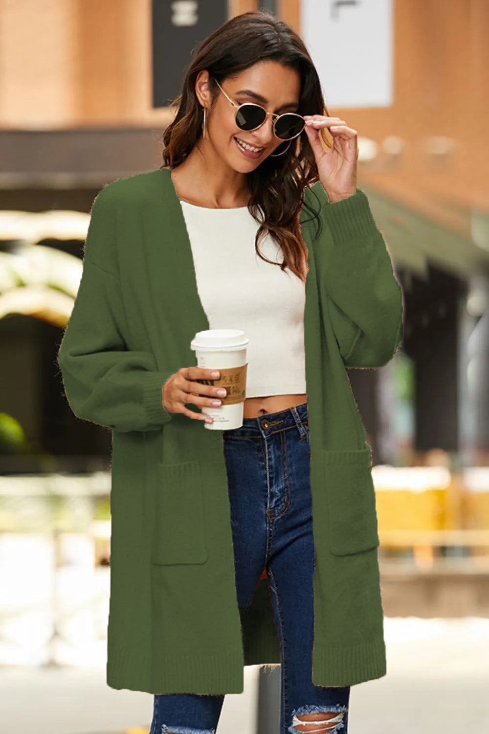 Knit coat for women with oversized and comfortable sleeves and practical pockets Lune London