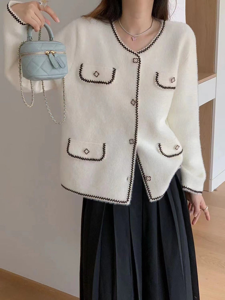 Ladies elegant knitted jacket with contrasting seams and pockets Lune London