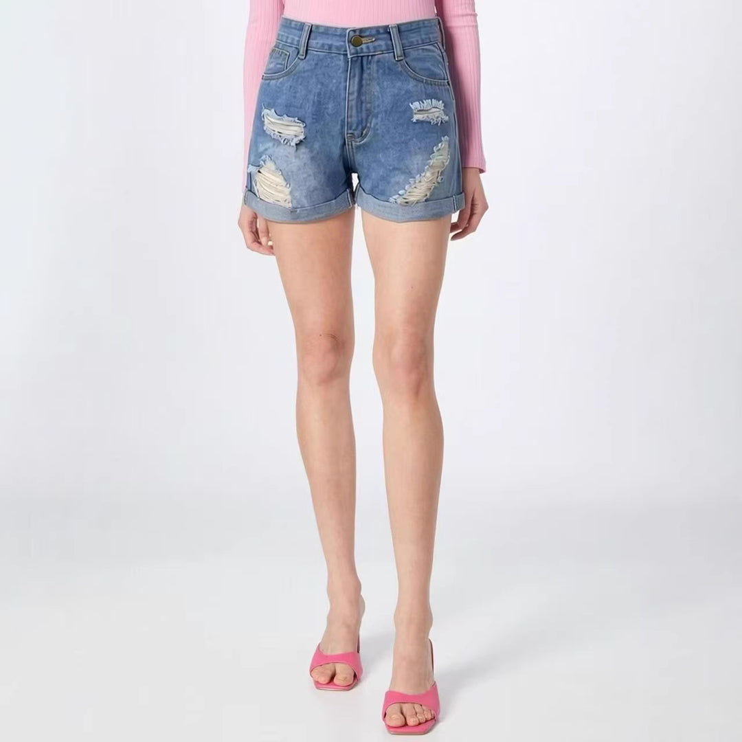 Women's destroyed denim shorts with high waist and stylish frayed look Lune London