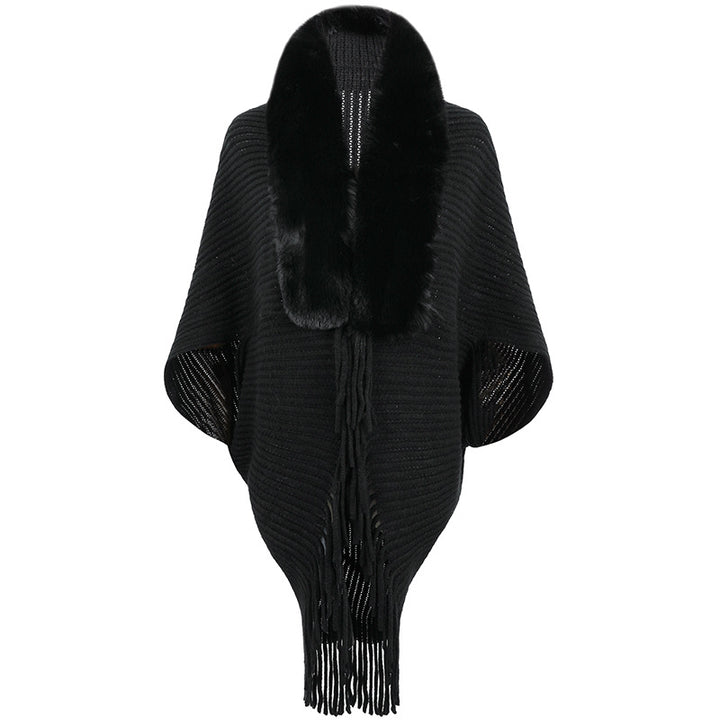 Luxurious knitted poncho for women with elegant faux fur collar and fringes Lune London