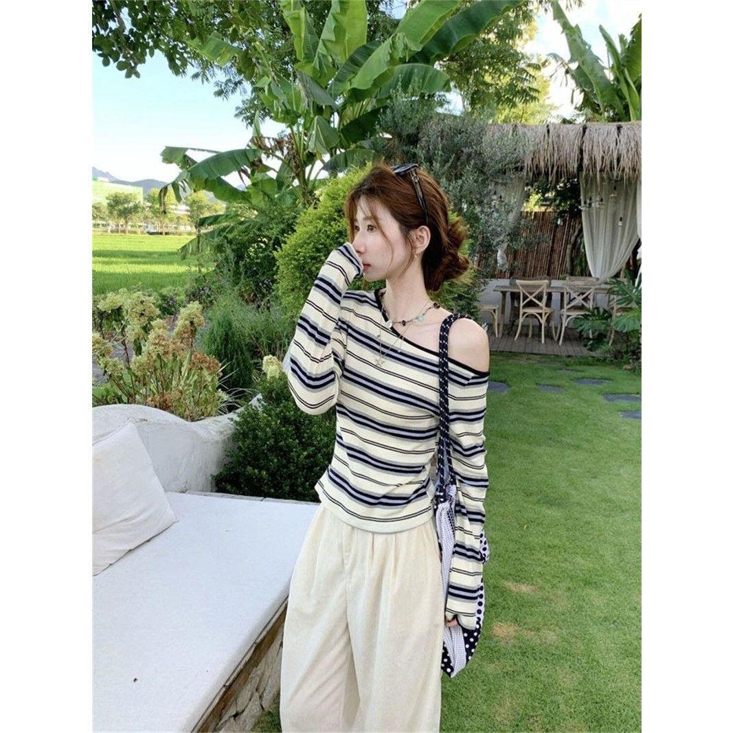Ladies trendy long sleeve shirt with off-shoulder design and maritime stripe pattern Chic & Stil