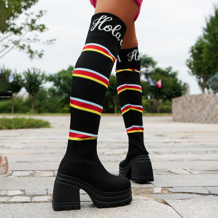 Women's boots in portrait format with colorful striped pattern and trendy block heel Lune London