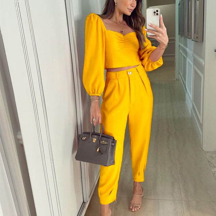 Two-piece outfit for women with puff sleeves and elegant high-waisted pants Lune London