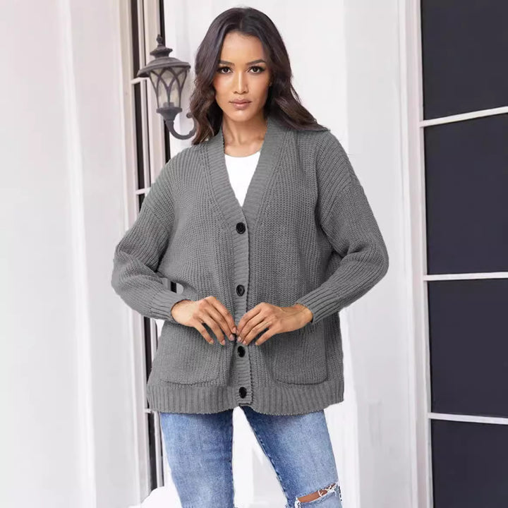 Ladies Chunky Knit Cardigan with practical pockets and classic button closure Lune London