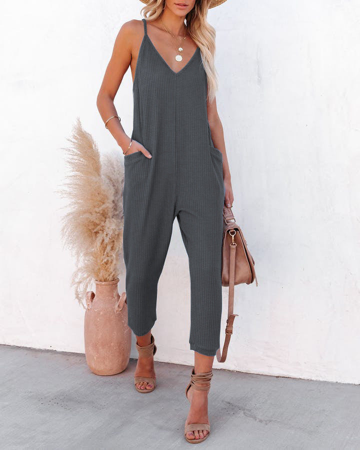 Ladies casual jumpsuit with deep V-neck and practical side pockets Lune London