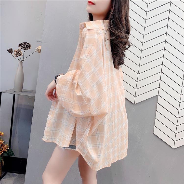 Chemise blouse décontractée à carreaux pour femmes avec coupe ample Chic & Stil