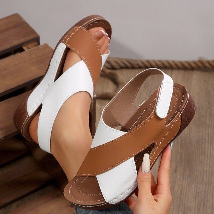 Elegant ladies sandals with decorative crossover straps and comfortable sole Lune London