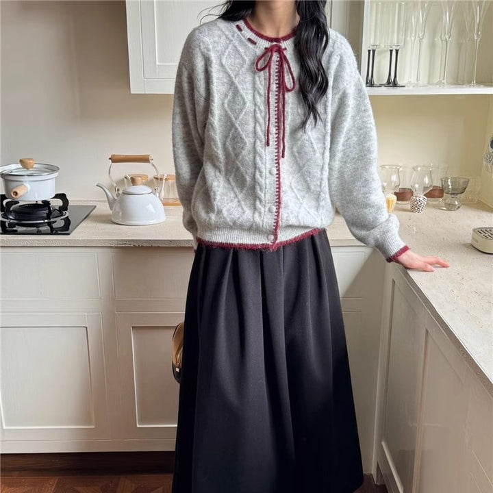 Ladies casual cardigan with twisted design and lace-up closure Lune London