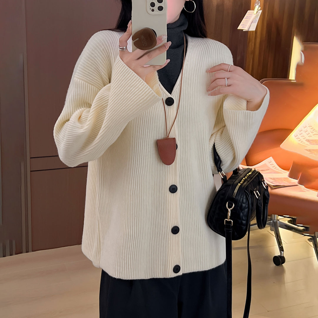 Ladies chunky knit cardigan with spacious pockets and deep V-neck Lune London