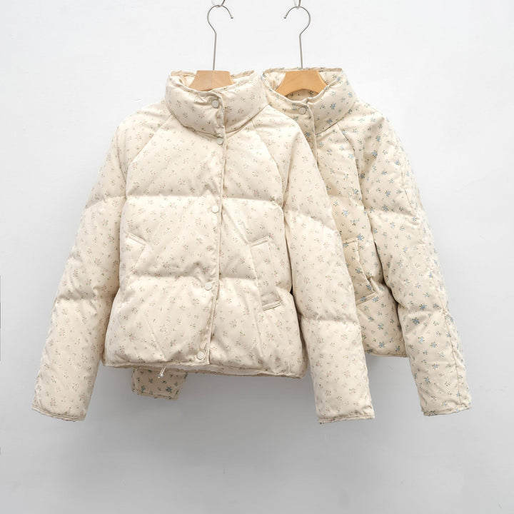 Veste matelassée volumineuse pour femmes avec un design floral et des poches pratiques Lune London