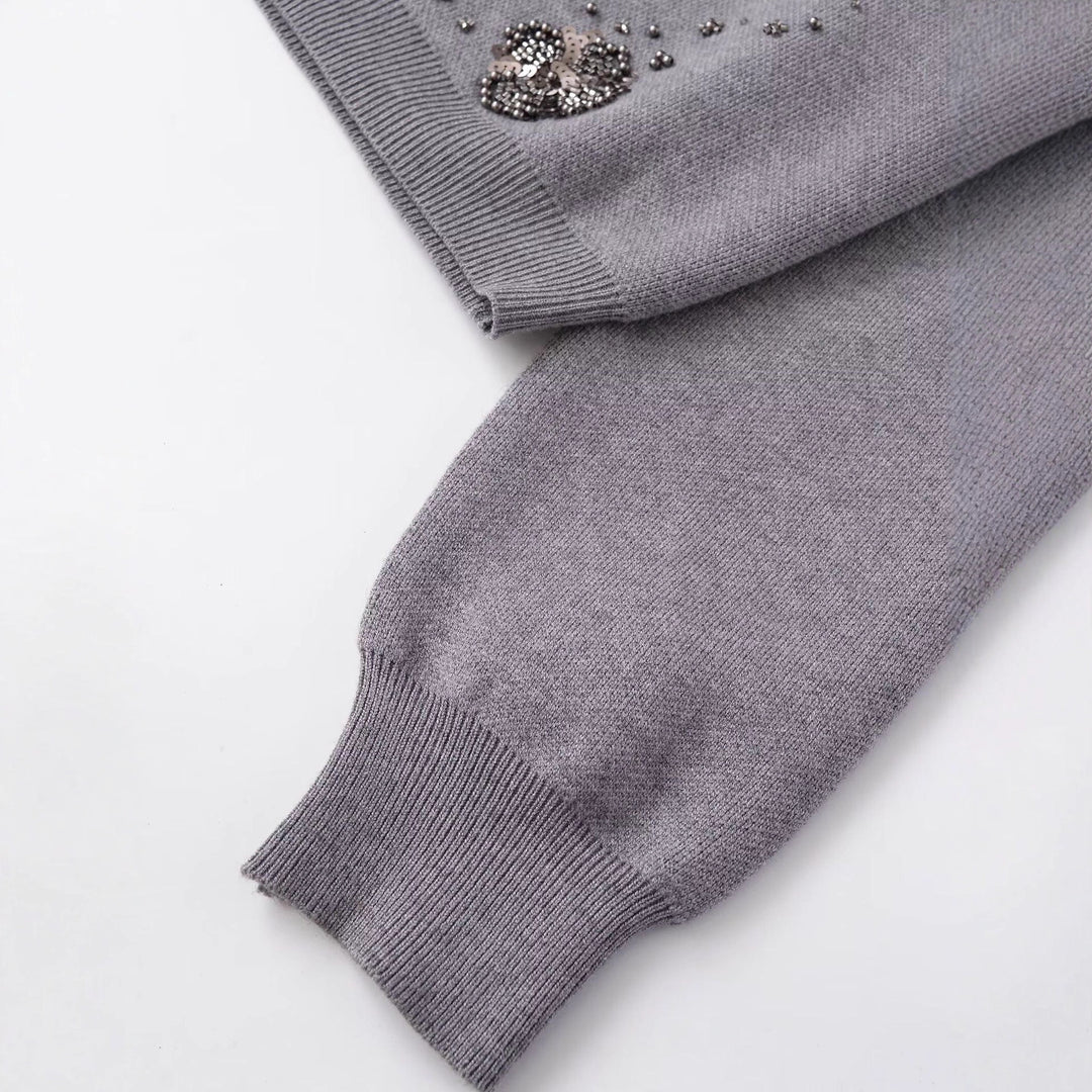Cardigan pour femmes avec des détails floraux scintillants Chic & Stil