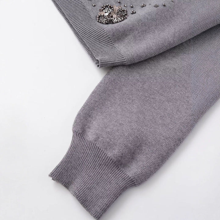 Cardigan pour femmes avec des détails floraux scintillants Chic & Stil