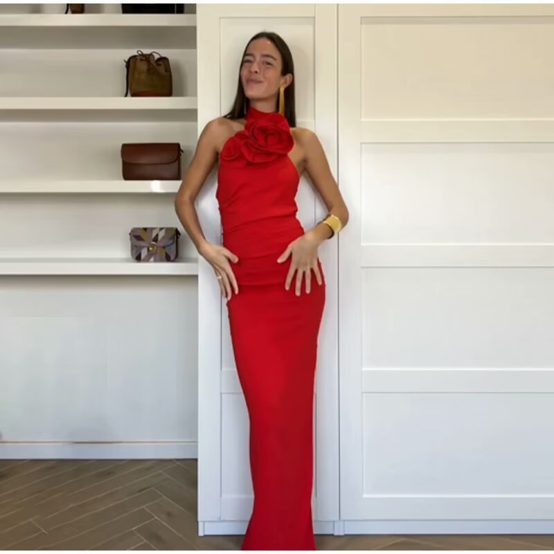 Maxi dress for women with a playful halter neck and an elegant bow. Lune London
