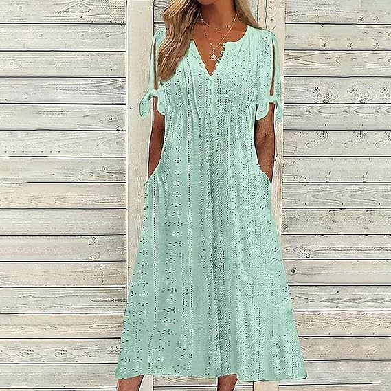 Airy midi dress for women with decorative hole patterns and practical pockets Lune London