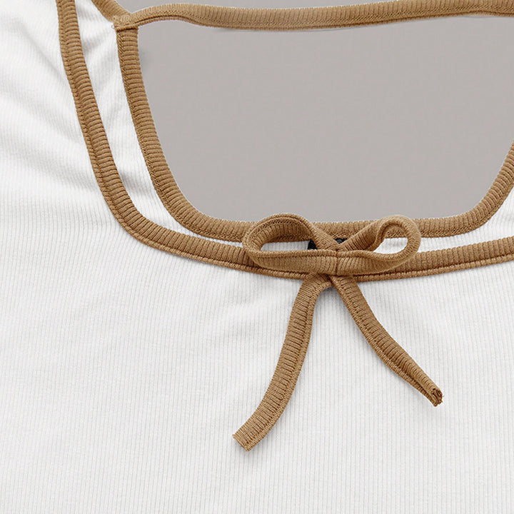 Long sleeve cropped top for women with an elegant square neckline and sophisticated knot details Chic & Stil
