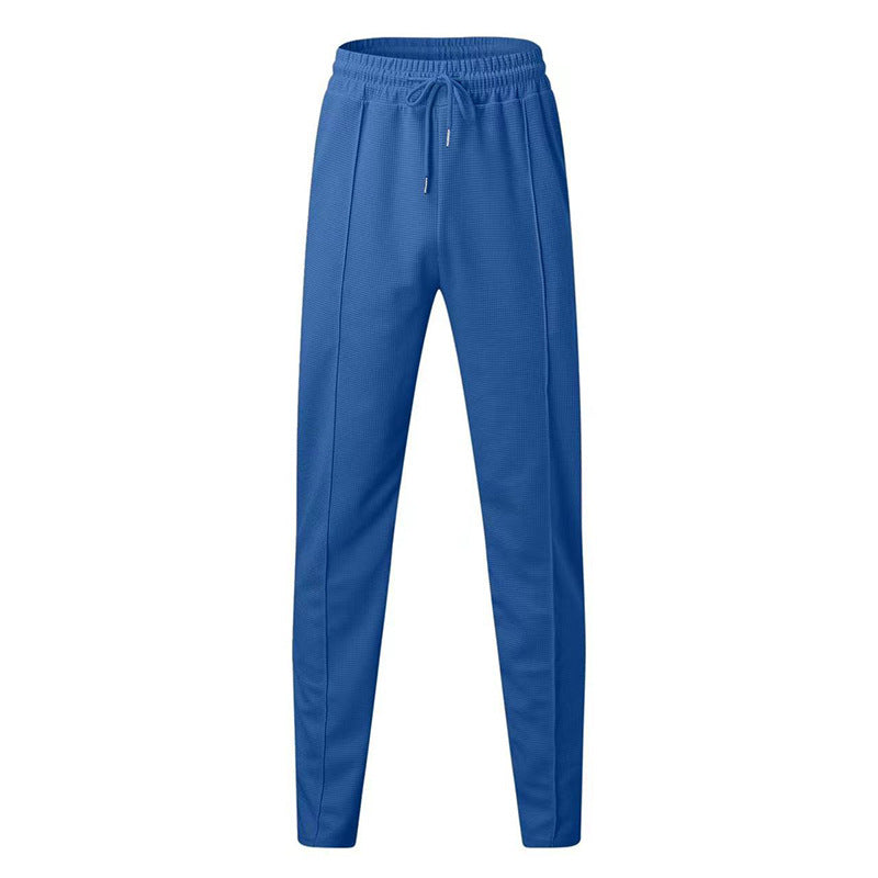 Sports jogger pants for men with elastic waistband and zip pockets Lune London