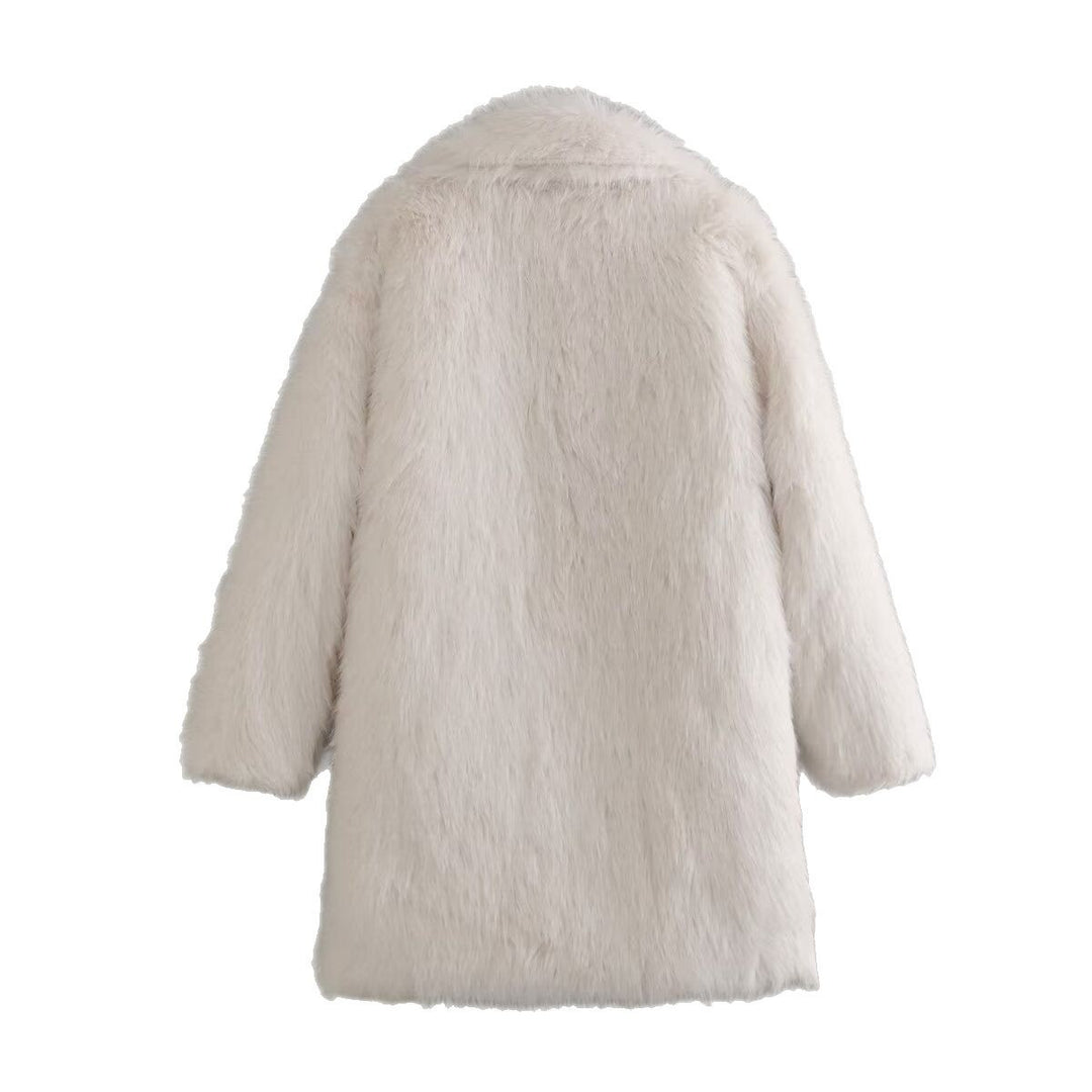 Faux fur coat for women with chic lapels and deep pockets Lune London