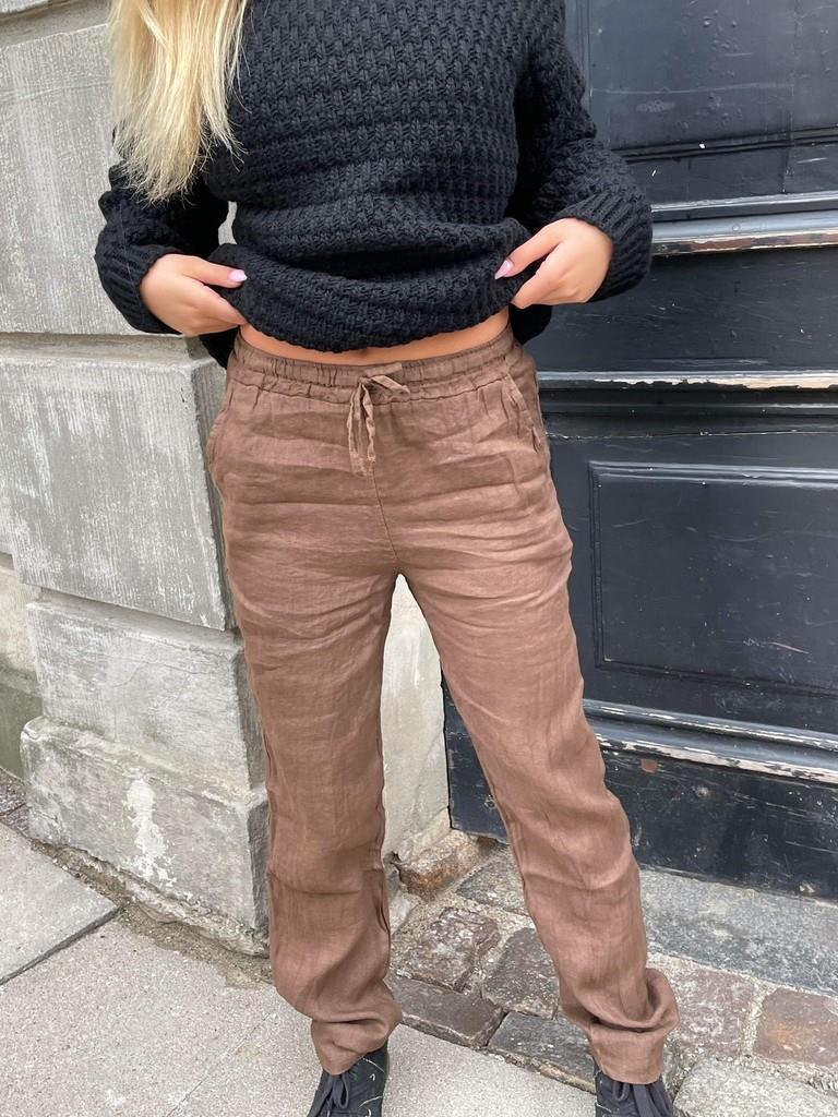 Loose linen pants for women with elastic waistband and side pockets Lune London