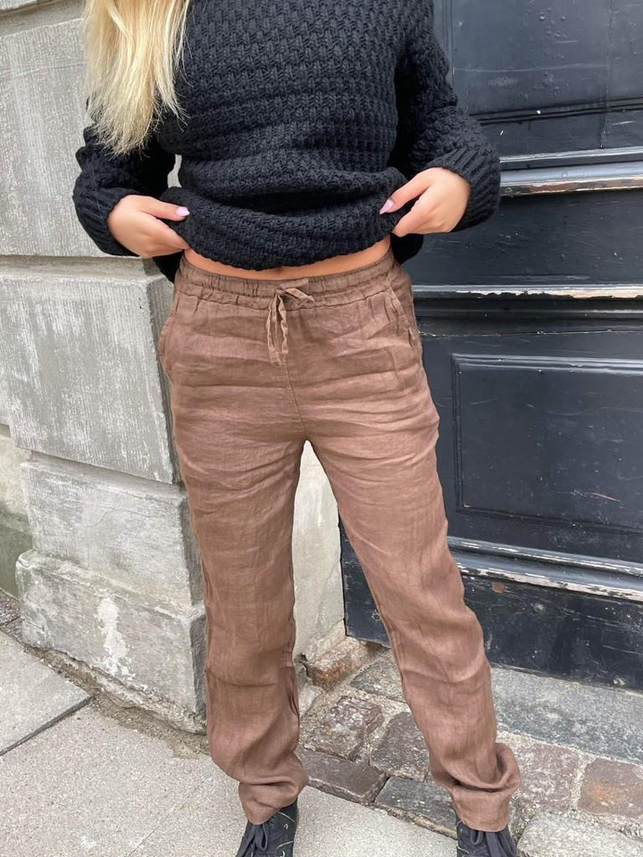 Loose linen pants for women with elastic waistband and side pockets Lune London