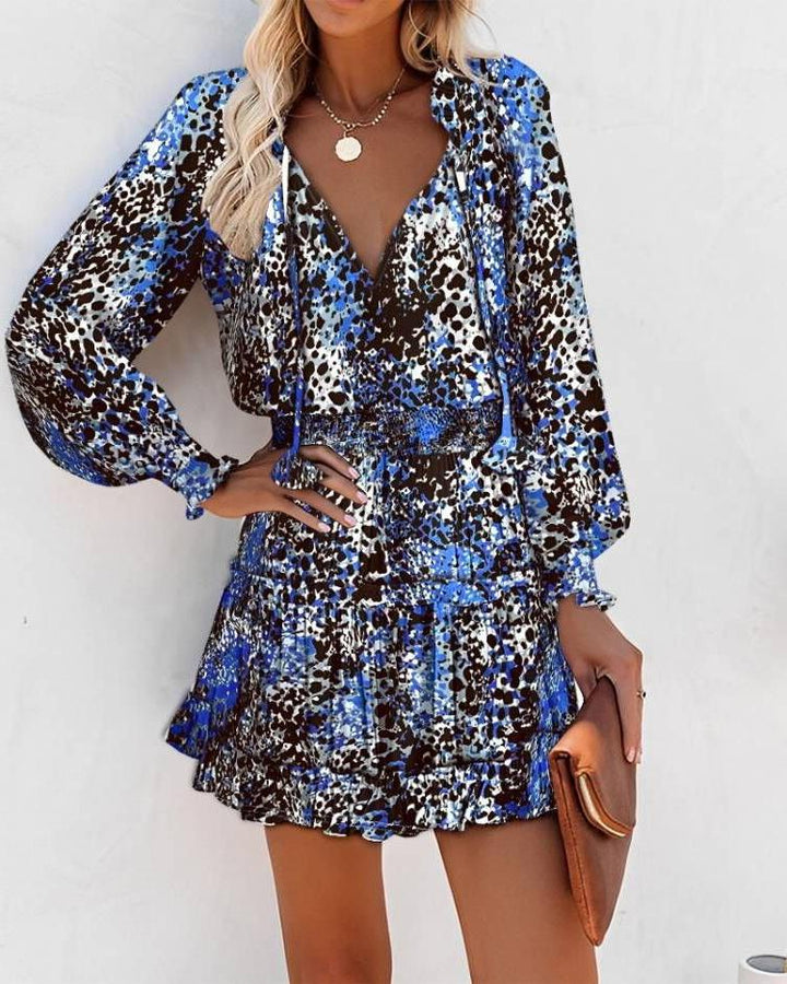 Ladies mini playful dress with colorful pattern and flounced details Lune London