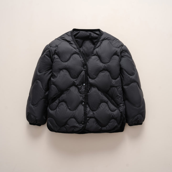 Quilted down jacket for women with modern wave patterns and practical pockets Lune London