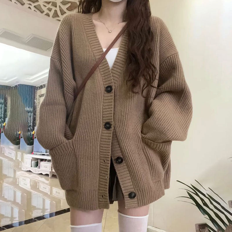 Oversized knit jacket for women with button closure and practical pockets Lune London