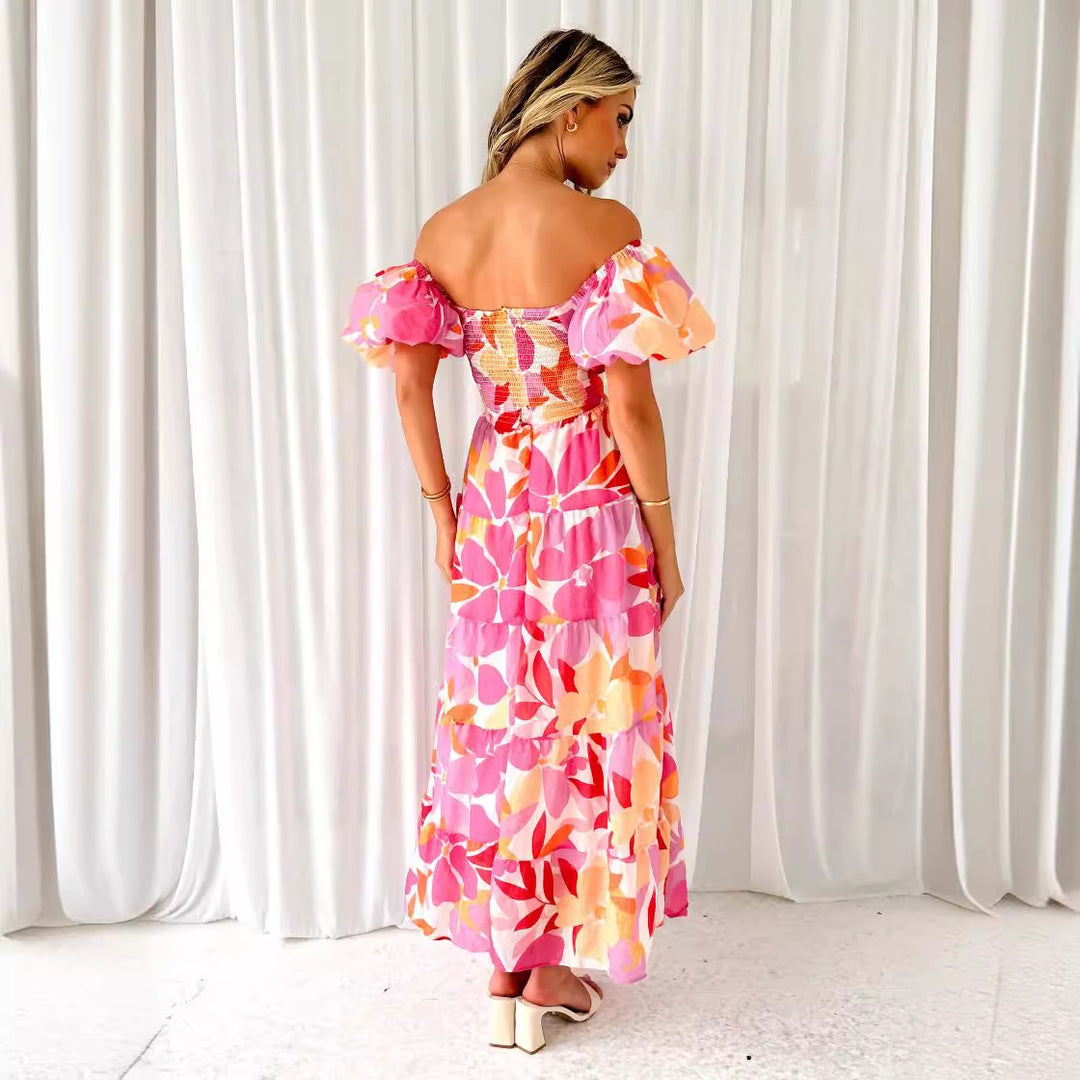 Maxi dress for women with a sophisticated design featuring off-the-shoulder and voluminous puff sleeves Chic & Stil
