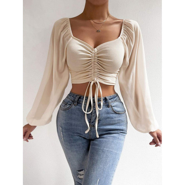 Trendy top for women with ruffles and long puff sleeves Lune London