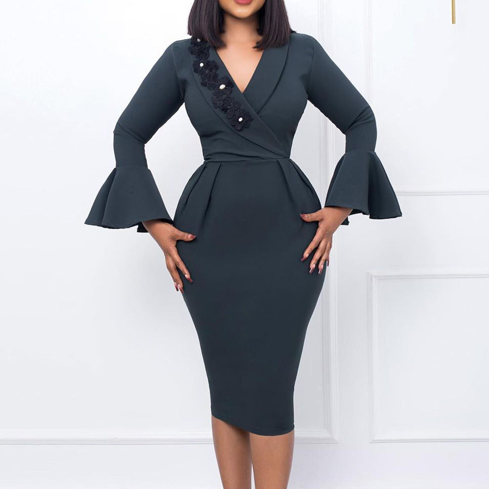 Floral accent chic and style women's wrap dress with ruffled sleeves