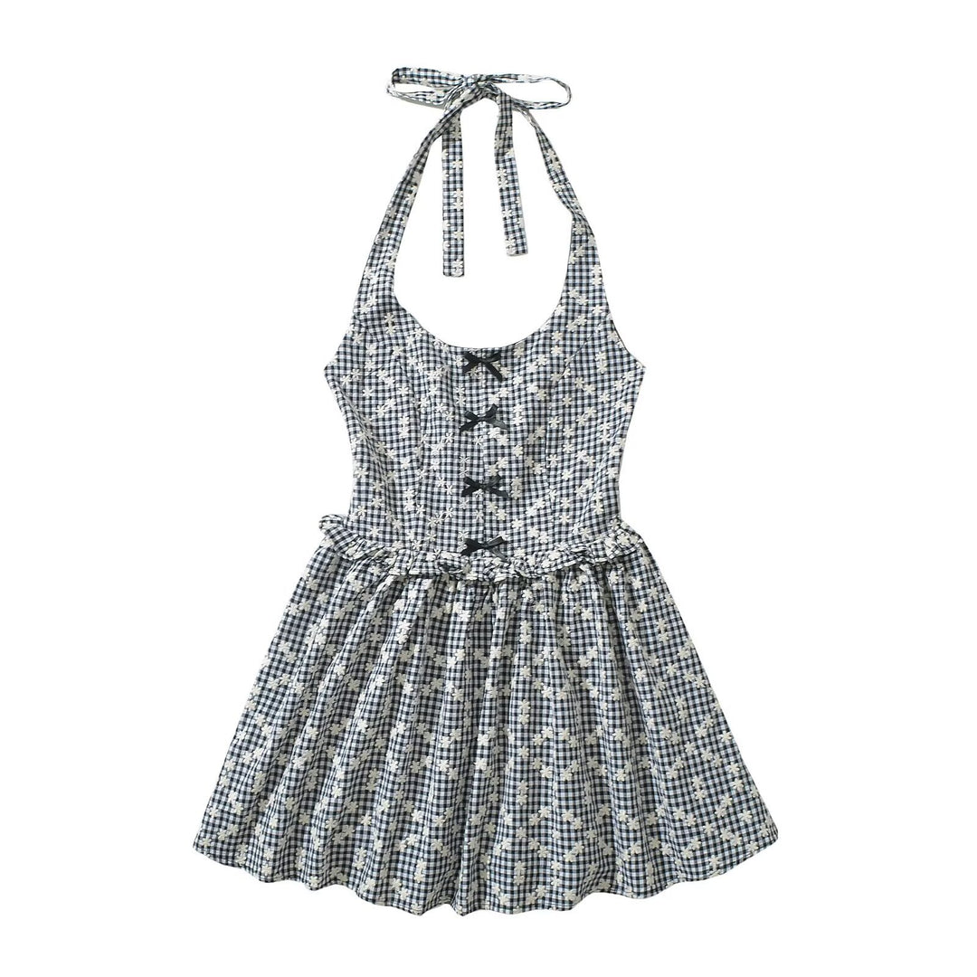 Leisure dress for ladies with a playful backless design and a floral plaid pattern Lune London