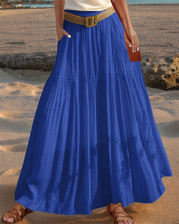 Maxi flared skirt for women with elegant pleated draping and practical pockets Lune London