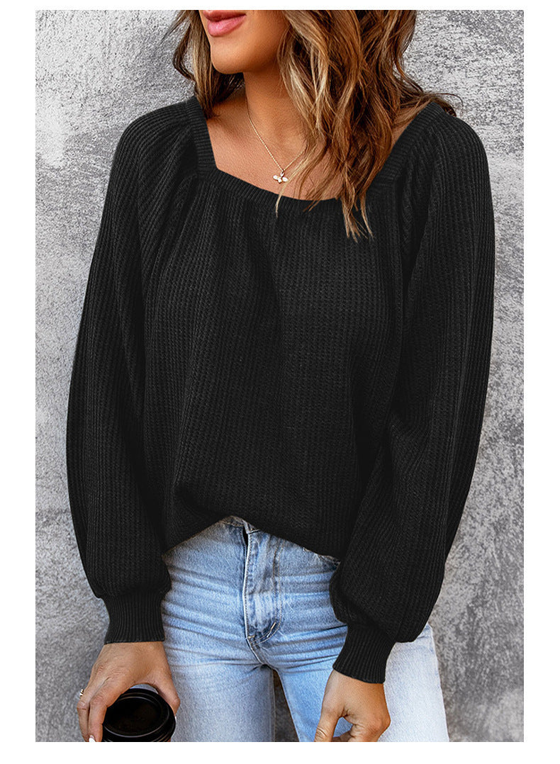Oversized knitted sweater for women with an open neckline and puff sleeves Lune London